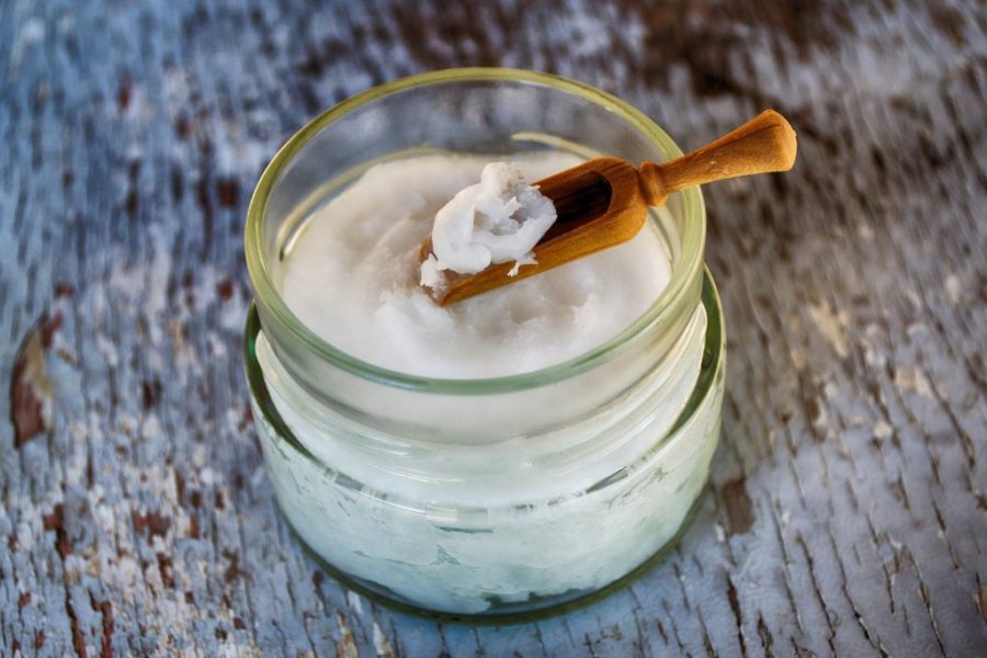 jar with coconut oil and scoop