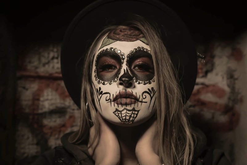 Girl with black and white sugar skull makeup