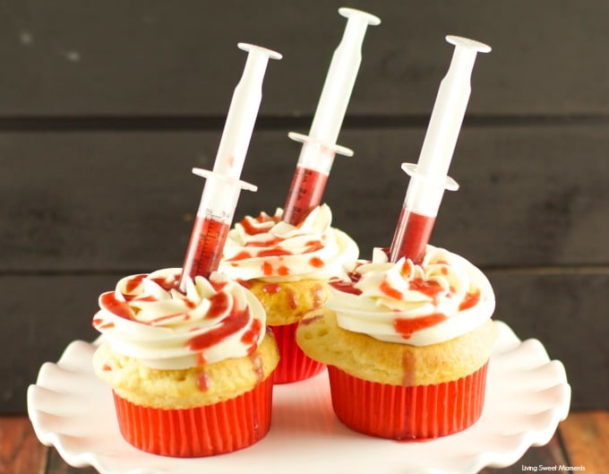 Three bloody cupcakes with syringe on top