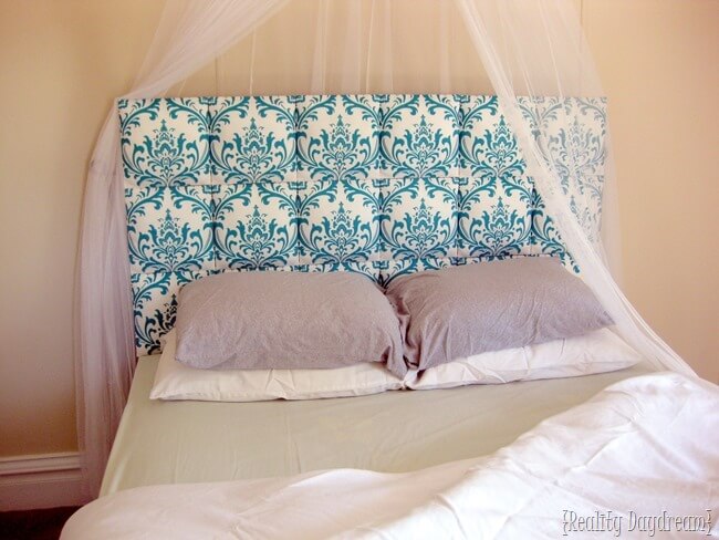 Bed with Upholstered Headboard with prints