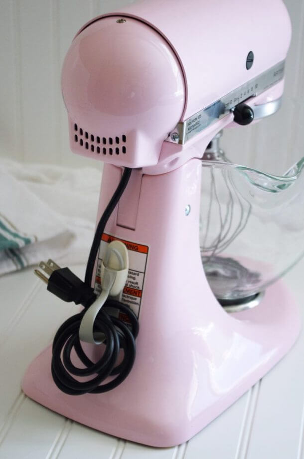 Small pink appliance with wrapped cord
